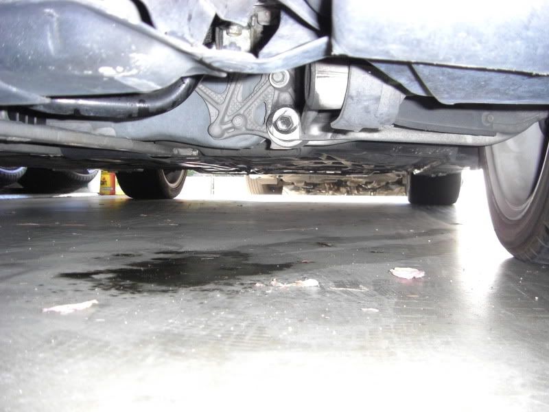 HELP Something's leaking, looks like brake fluid. (pictured)